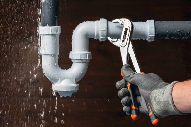 Professional Drain Cleaning technician working in College Station, TX